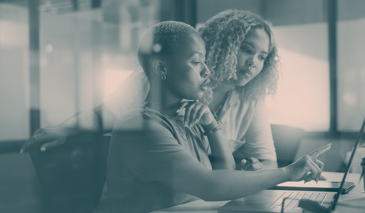 two women looking at data