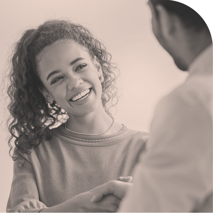 Girl Shaking Hands with Another Person