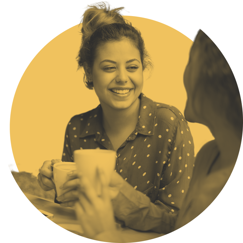 Two Women Meeting Over Coffee